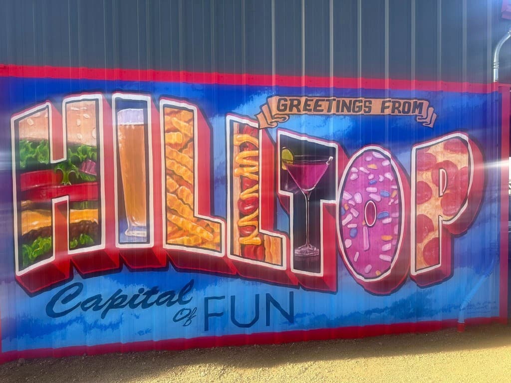 Greetings from Hilltop — mural at Hilltop Truck Park